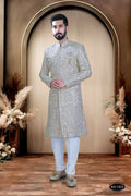 Onion-Pink silk sherwani-style kurta for toddlers with heavy thread and sequence embroidery.