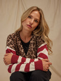 Close-up of the Cicely Print Stripe Mix Sweater Knit Cardigan showing the button-front closure and stripe-animal print pattern.