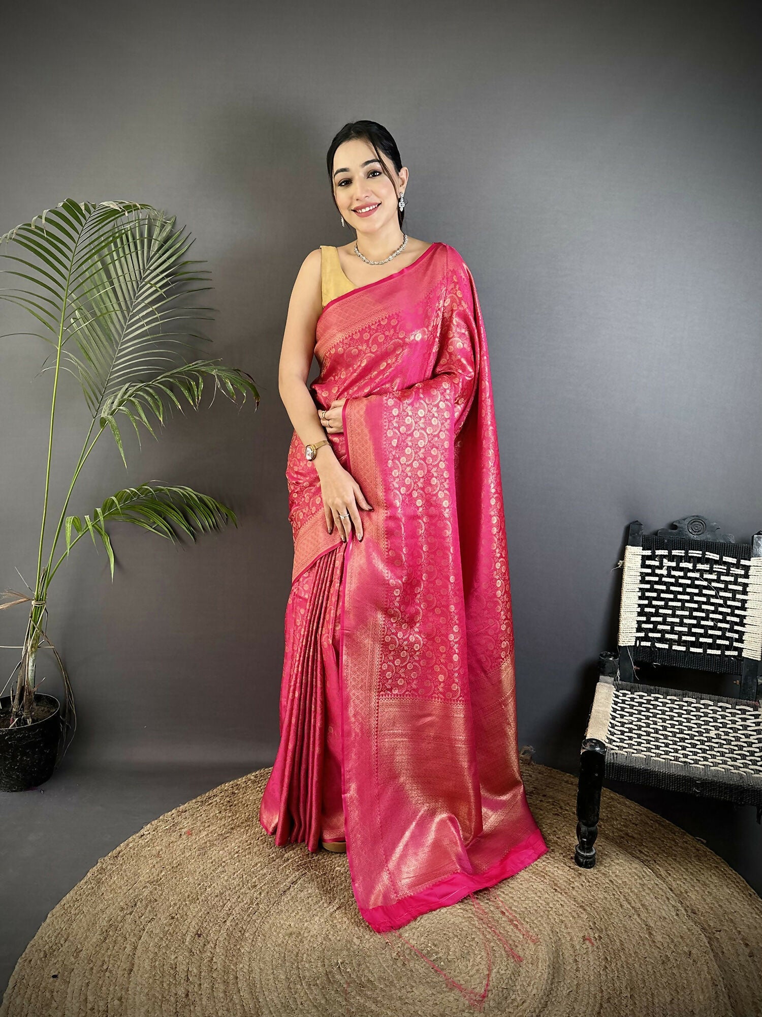 Rani Pink Soft Satin Silk Banarasi Saree with floral and paisley motifs