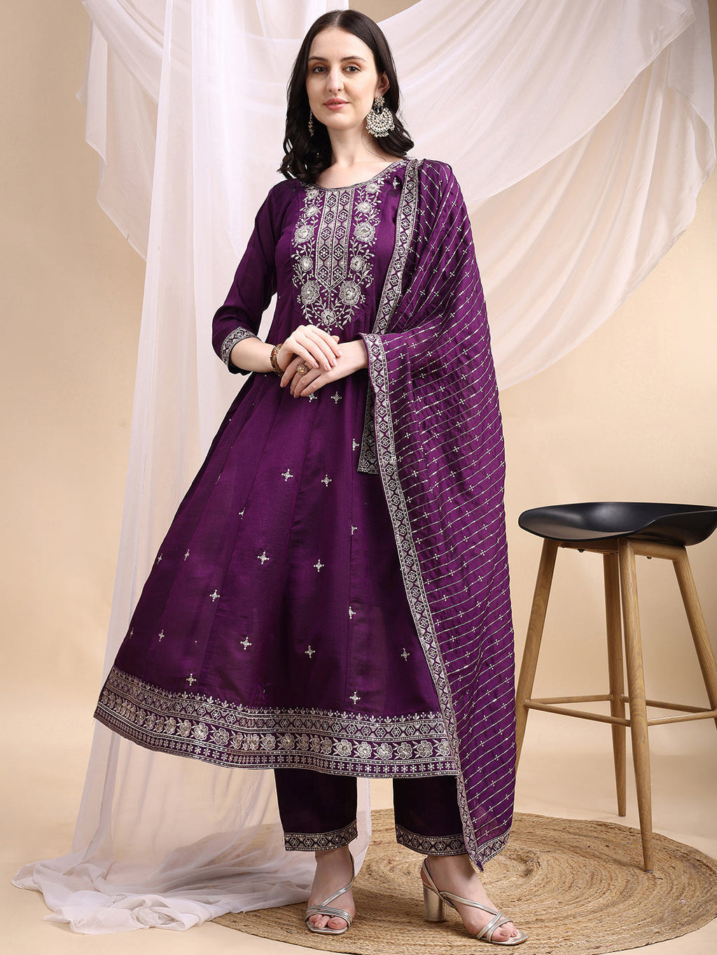 Elegant purple Anarkali kurta with matching pants and embroidered dupatta
