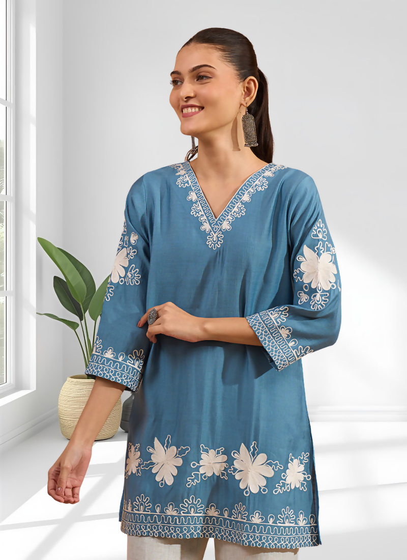 Elegant teal silk tunic with detailed embroidery and a V-neck design