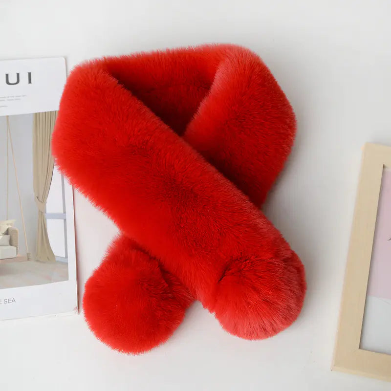 Women wearing a plush faux rabbit fur scarf available in white and red color options