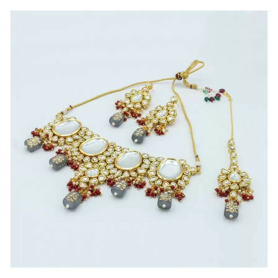 Multicolor Kundan necklace set with gold plated finish and adjustable cord