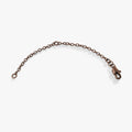 Set of three 3-inch necklace cable chain extenders in shiny gold, silver, and chocolate finishes.
