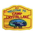 Camp Crystal Lake circular embroidered patch on a denim fabric background