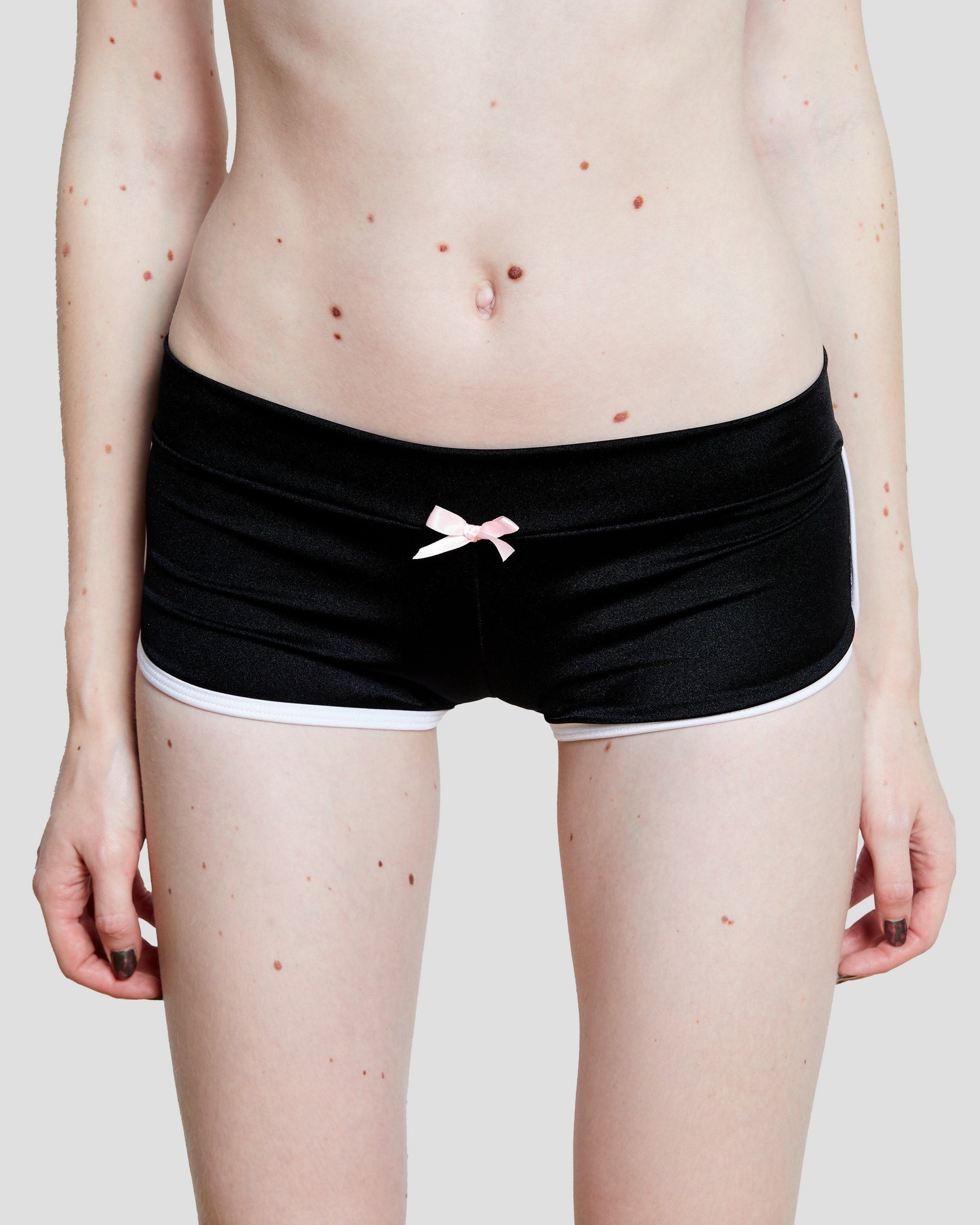 Flirty Purrfect Booty Shorts in black with rhinestone lettering on the back and a dainty satin bow.