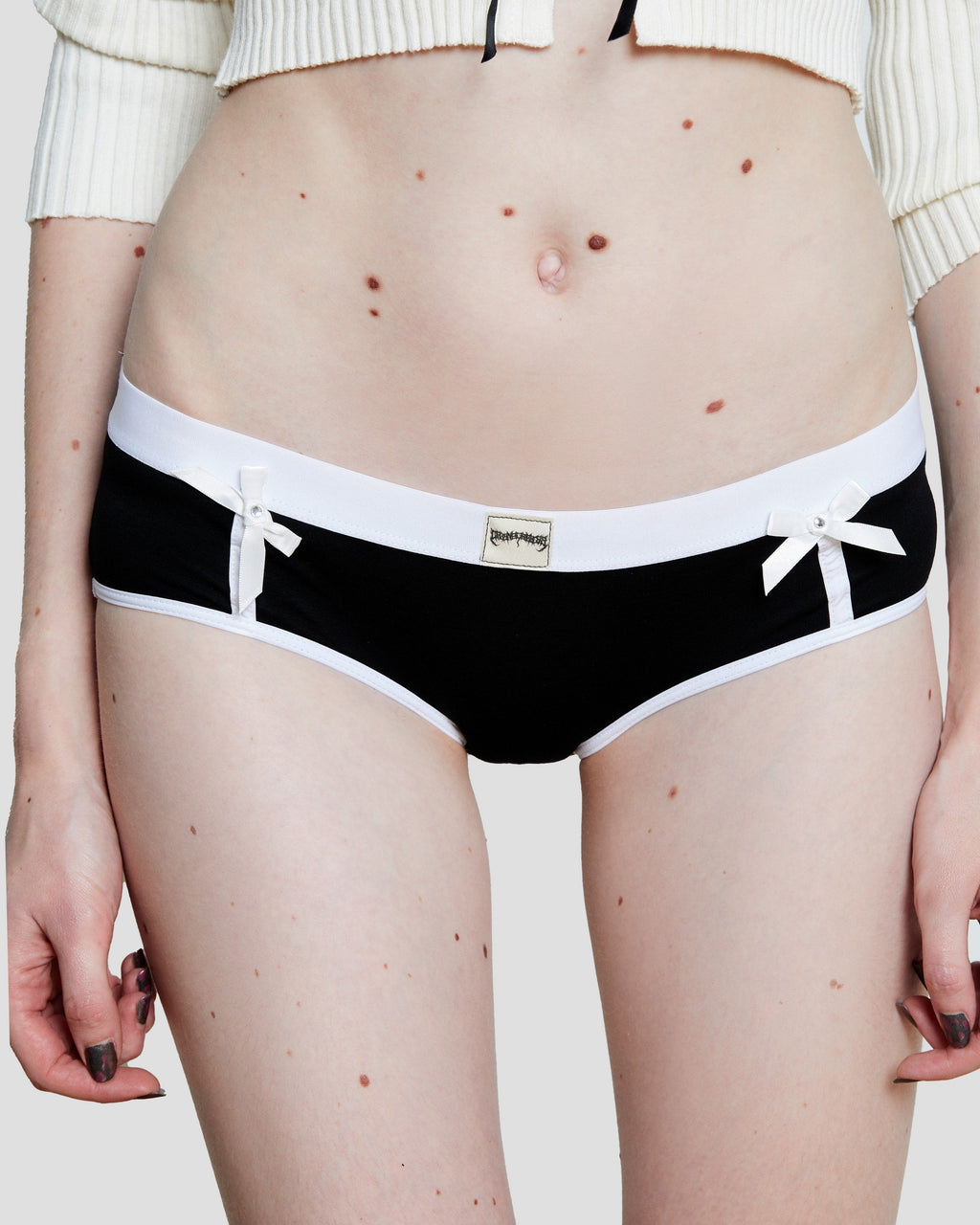 Black and white Kitty Girl Boyshort with pearl-topped satin bows and contrast trim