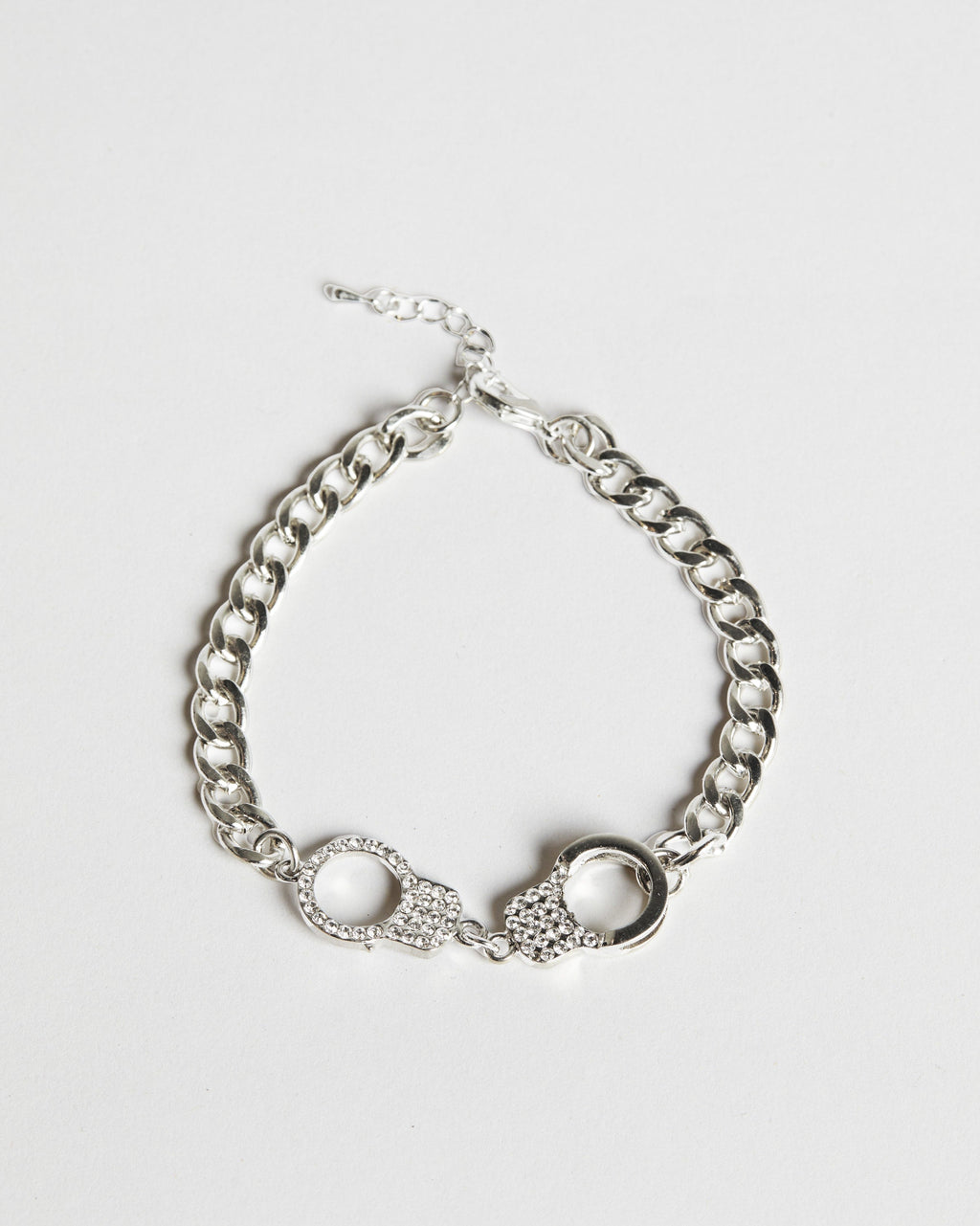 Chained Desire silver anklet with delicate handcuff design and crystal stone accents