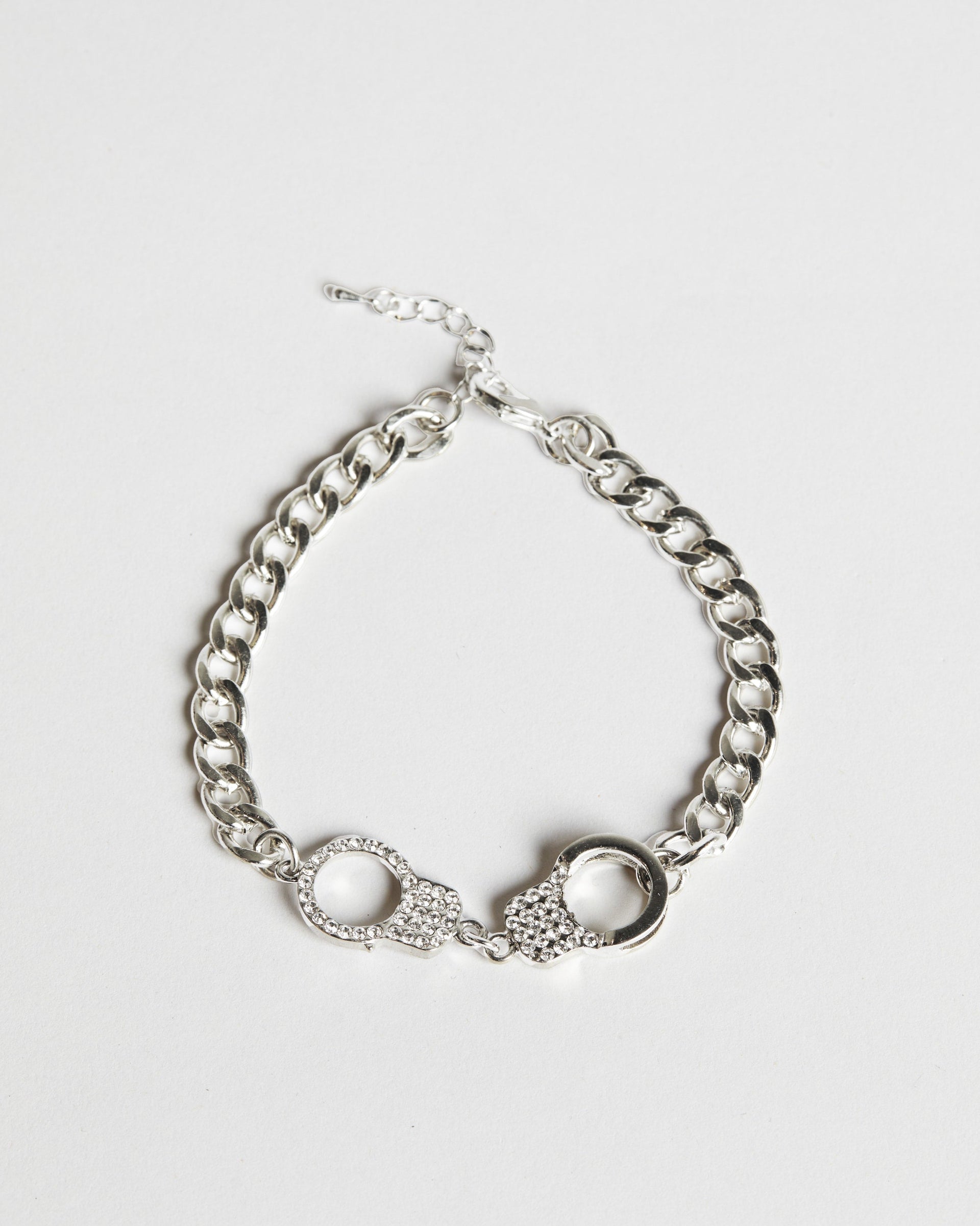 Chained Desire silver anklet with delicate handcuff design and crystal stone accents