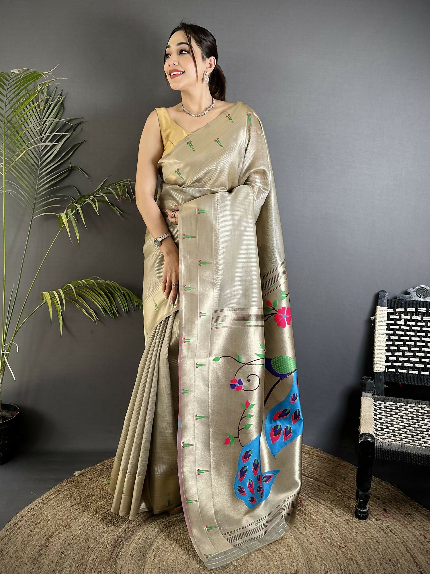 Elegant Beige Tissue Paithani Saree featuring intricate peacock and floral embroidery motifs