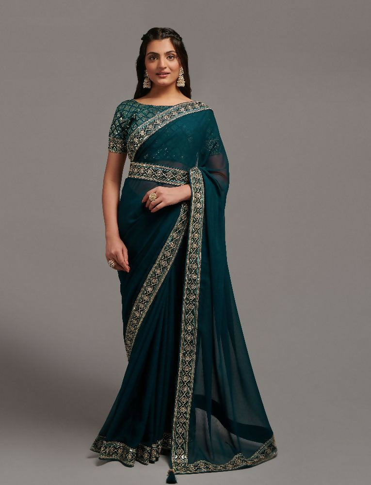 Petrol blue Zometo saree with delicate embroidery and lace work