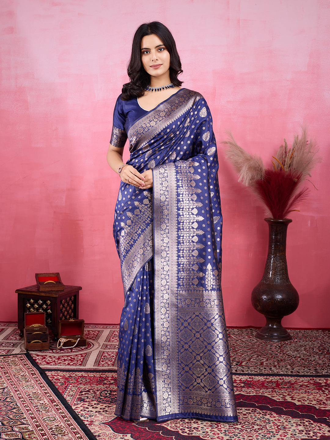 Navy blue Litchi silk Banarasi saree with golden Jacquard Zari patterns.
