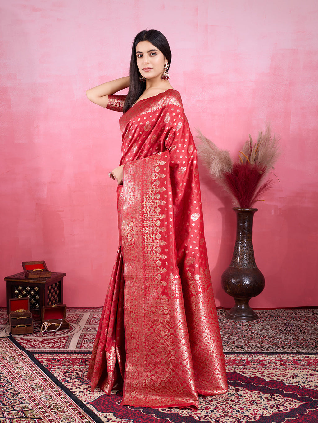 Red Litchi silk Banarasi saree with intricate golden Jacquard Zari patterns.
