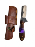 Close up of the Titan Purple Ridge Skinner featuring a forged-finish blade and purple resin-accented hardwood handle.
