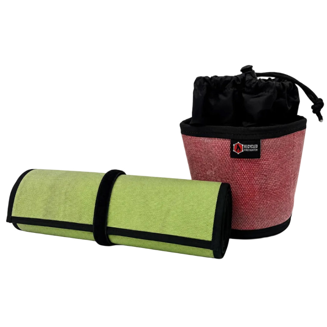 Recycled Firefighter Range Kit featuring a heavy-duty fire hose rifle mat and matching ammo bag on a shooting range.