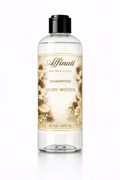 A bottle of Ivory Woods sulfate-free shampoo with botanical label design