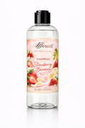 A 16 oz bottle of Affinati Strawberry Banana Shampoo with a clear bottle and a label featuring strawberry and banana illustrations.