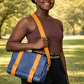 Navy blue leather Serawit crossbody bag with mustard yellow straps and buckle detail