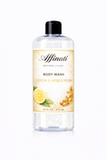 A clear plastic bottle of Affinati Lemon and Amber Musk body wash with a black cap on a white background.