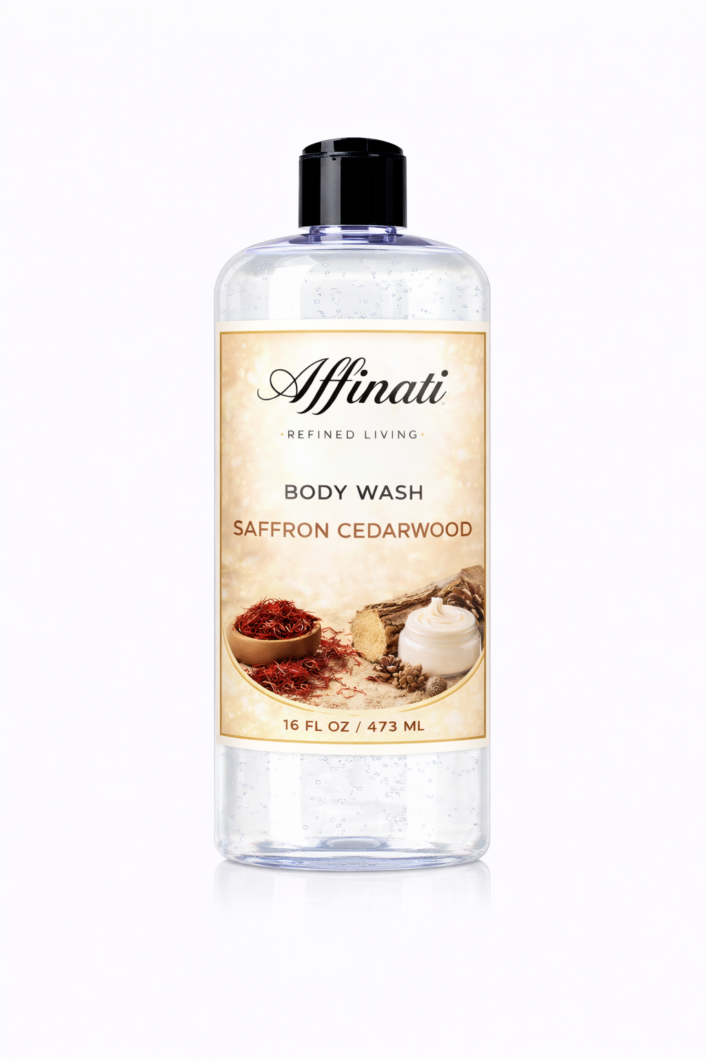 A clear plastic bottle of Saffron Cedarwood Body Wash featuring a label with images of saffron threads and cedar wood, 16 oz size.