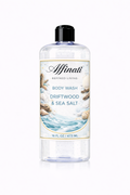 Clear 16 oz bottle of Affinati Driftwood and Sea Salt Body Wash with beach-themed label featuring shells and driftwood