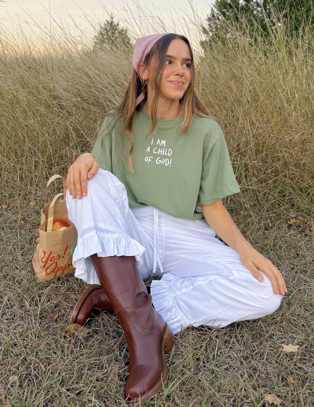 Women wearing a soft cotton Child of God cropped t-shirt with dropped shoulders