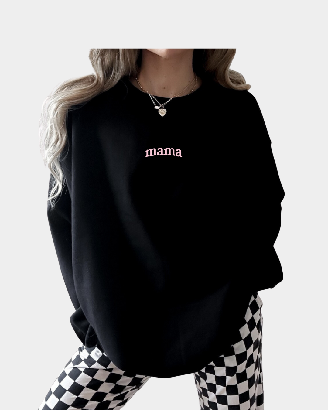 Woman wearing a cotton Mama Minimal Pullover available in Black, White, and Pink colors