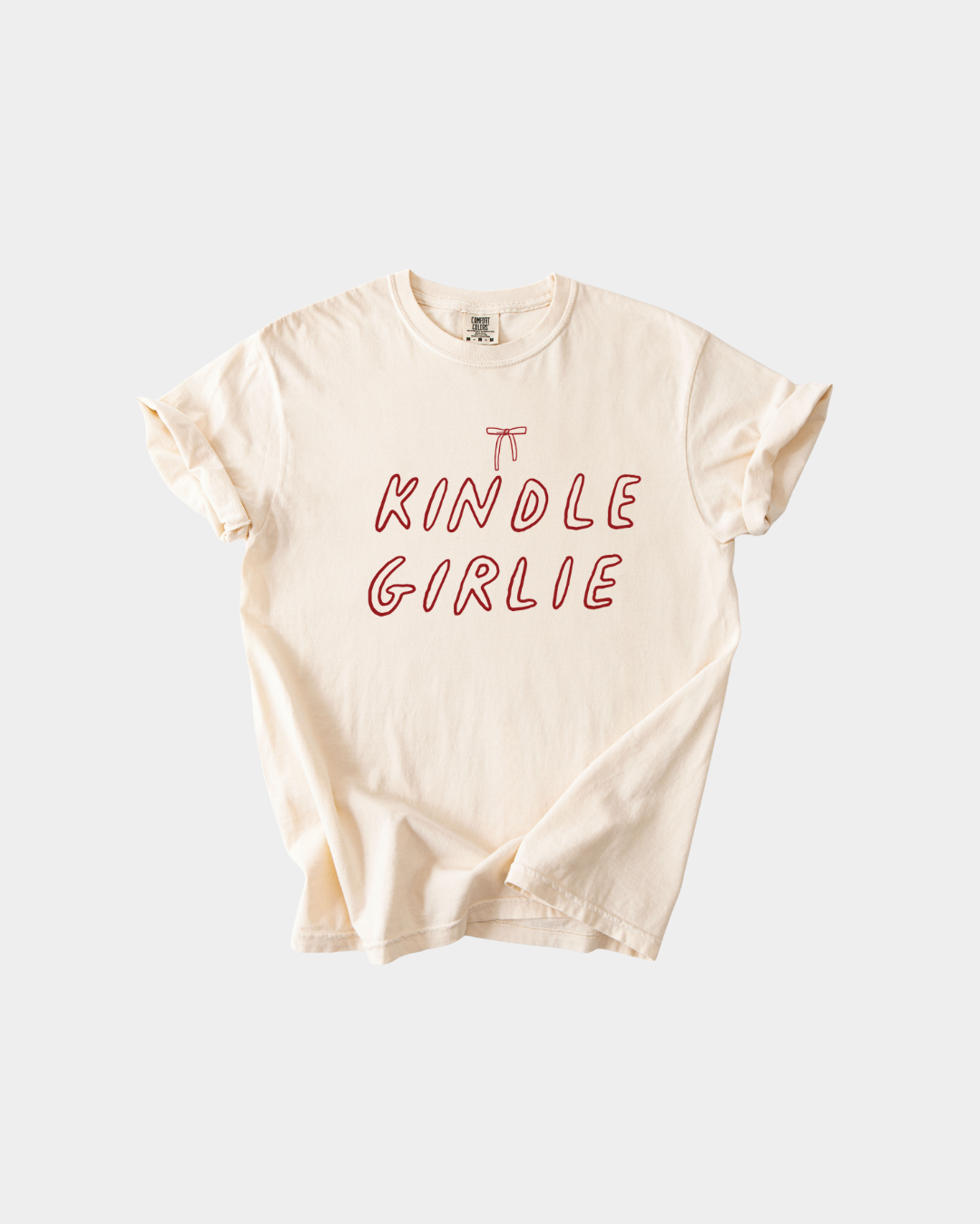 Women's relaxed fit graphic tee with Kindle Girly print on a soft cotton base.