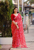 Red Poly Georgette Ethnic Motifs Saree with Unstitched Blouse - Hiral Fashion