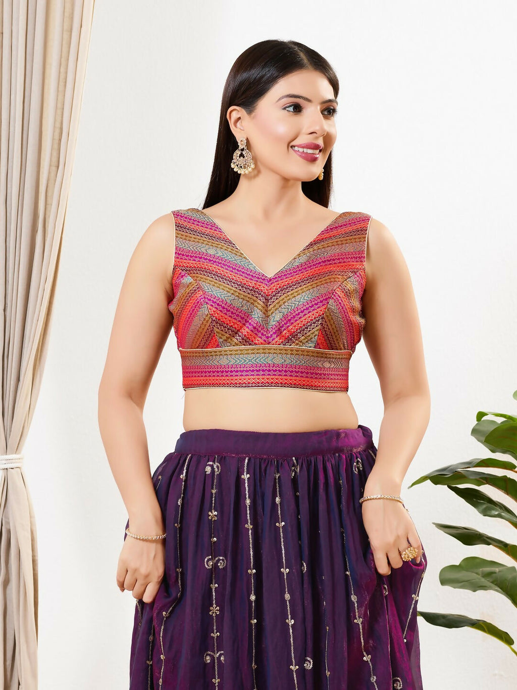 Magenta multi brocade sleeveless V-neck padded saree blouse