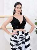Elegant black sleeveless sequin blouse with V-neck and back-open detail