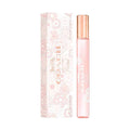 Coach New York Floral Eau de Parfum travel spray bottle, 10ml size with pink and gold design.
