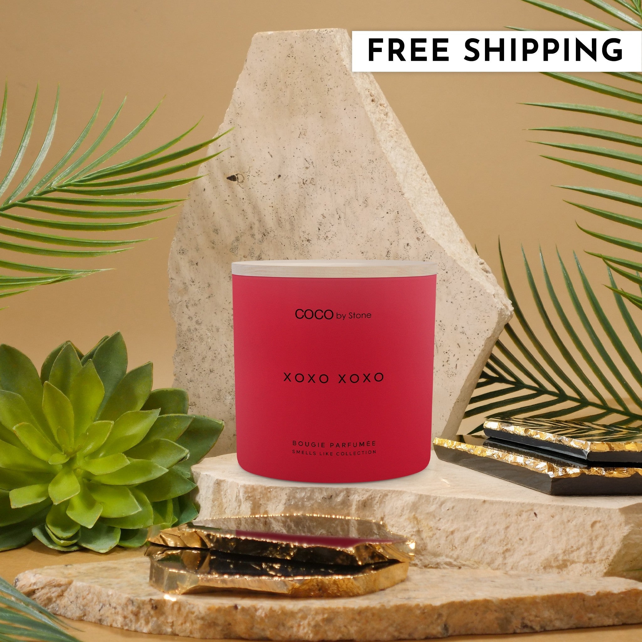 15oz XOXO XOXO scented candle in a pink vessel with a wooden lid, surrounded by romantic valentine-themed decor.