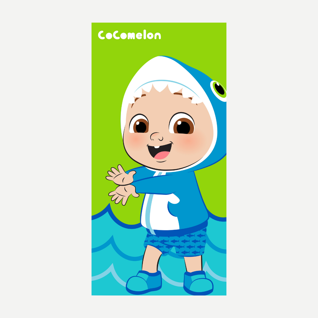 Cocomelon beach towel featuring JJ wearing a blue shark costume on a green background with blue waves