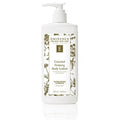 Eminence Coconut Firming Body Lotion bottle in white and green packaging.