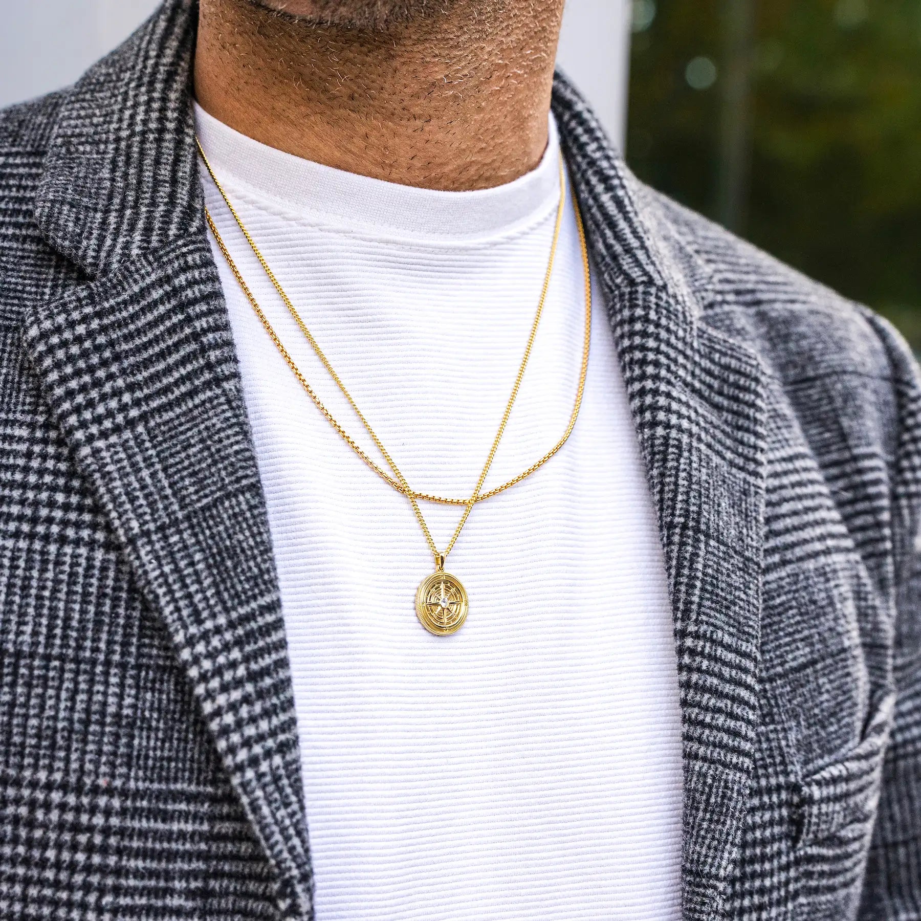 Gold Compass Pendant Necklace with Sapphire Detail