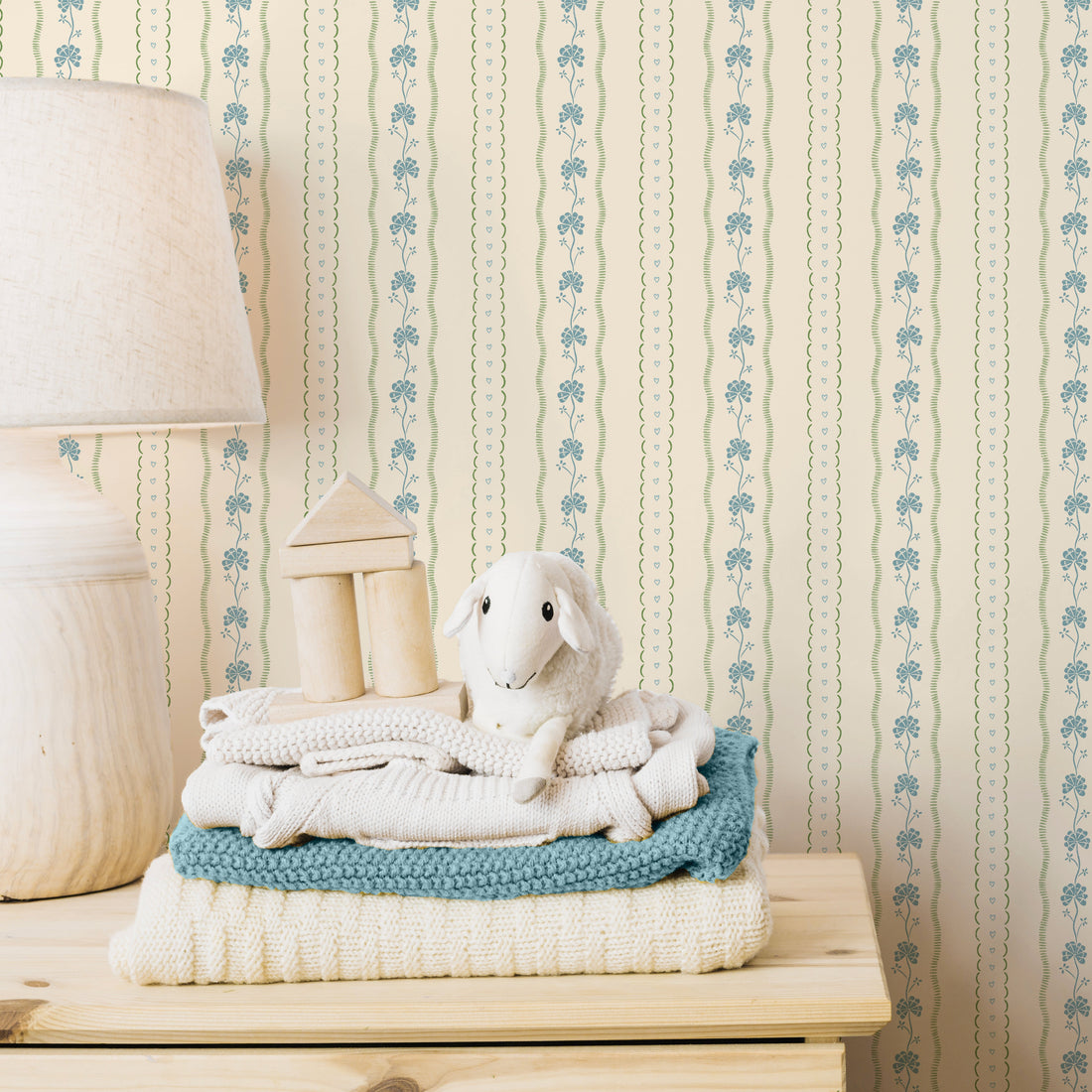 Constance floral wallpaper in cream, blue, and green vintage style