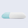 Side view of a white and light blue perforated cooling memory foam pillow