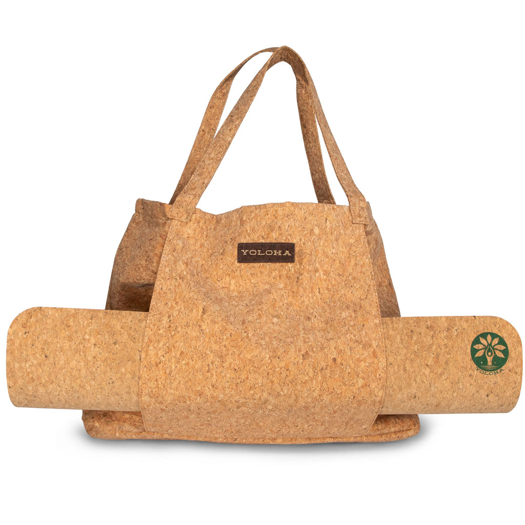 Premium Cork Tote Bag featuring a convenient exterior yoga mat holder and stylish, natural finish.
