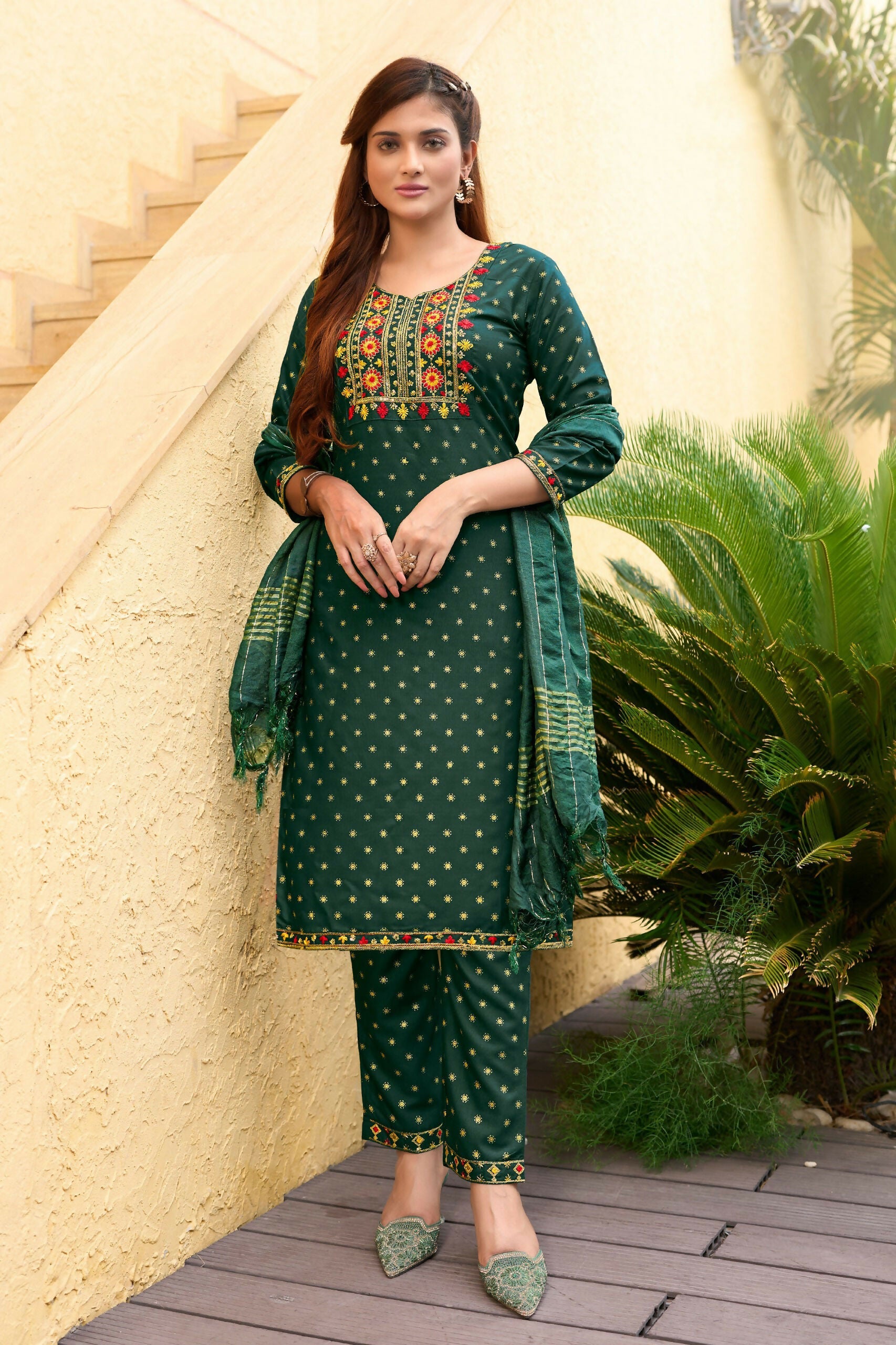 Bottle Green 14KG Rayon kurta with gold foil print and embroidery details.