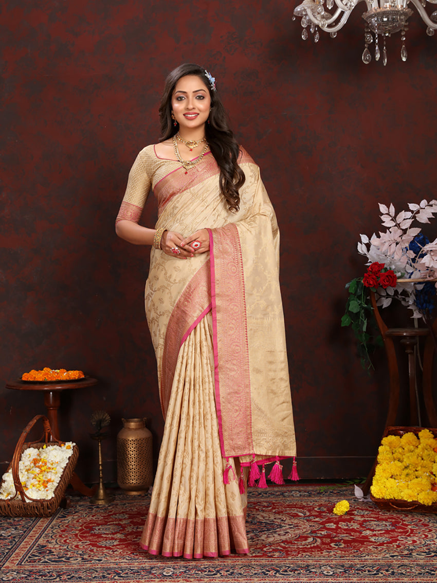 Cream Soft Katan Silk Saree with gold Zari weaving detail on the pallu.