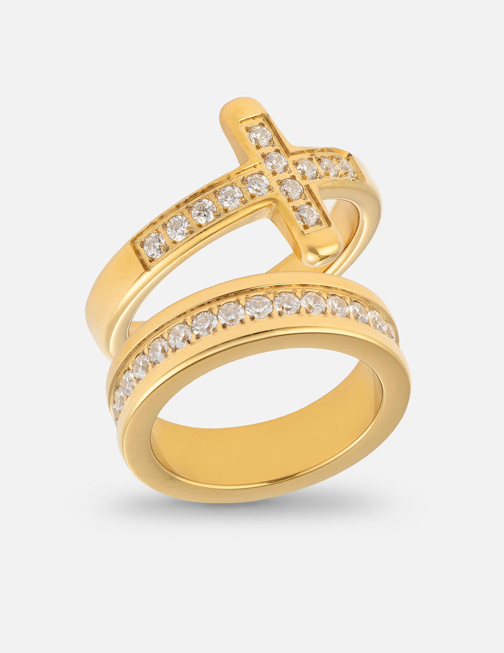 Close-up of a silver-tone Cross Eternity Gem Ring Set showing intricate detail on a model's hand.