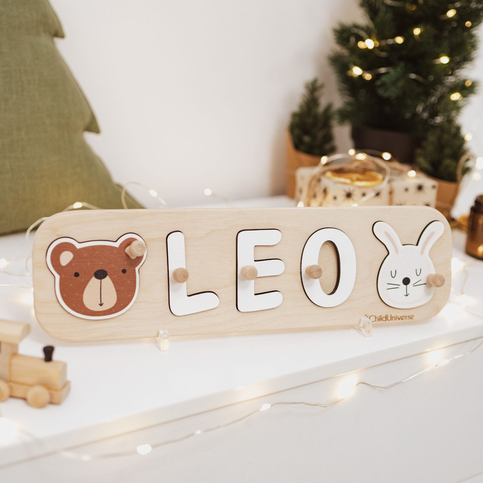 Custom wooden name puzzle for children in natural wood and multi-colored finish