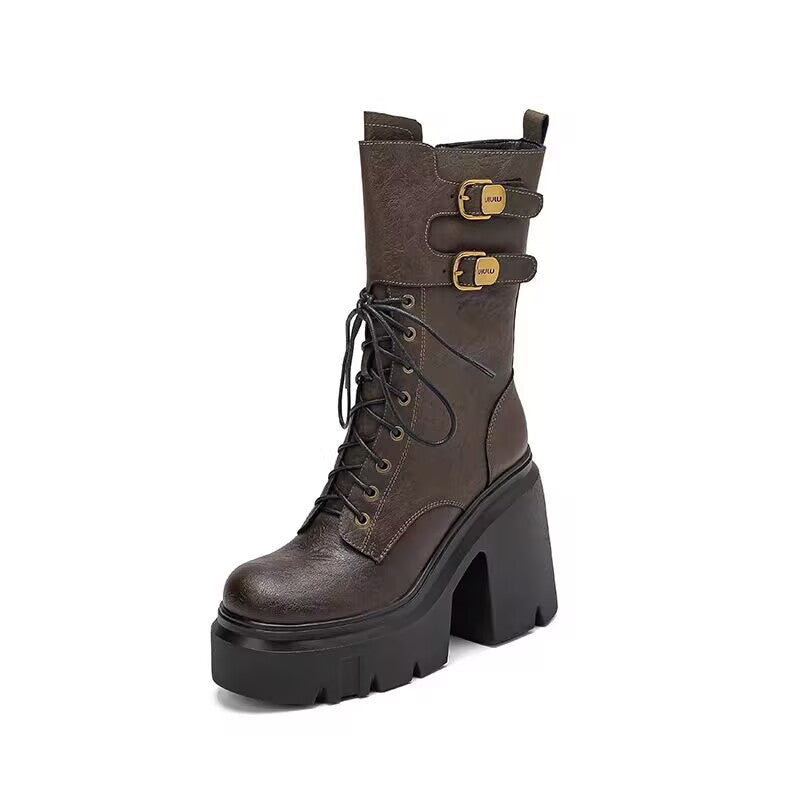 Chunky platform combat boots for women featuring a lace-up front, prominent lug sole, and decorative buckle straps. Available in dark brown and black.