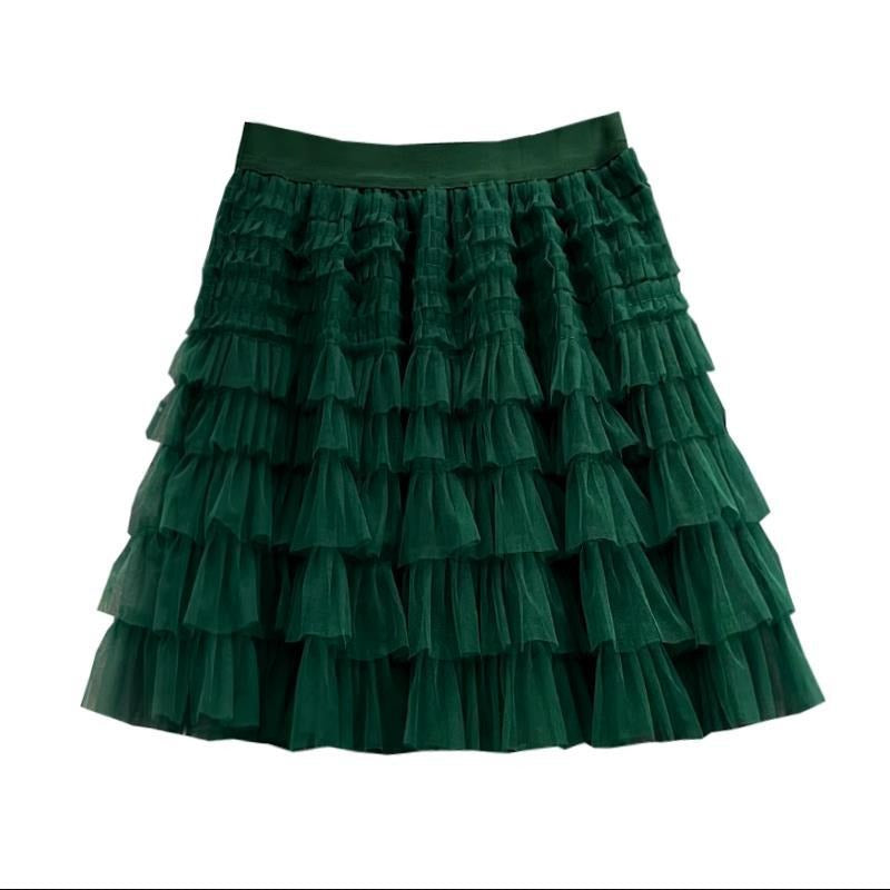 Women's layered mesh A-line mini skirt in dark green, featuring fluffy tulle ruffles and an elastic waist, perfect for a playful style.