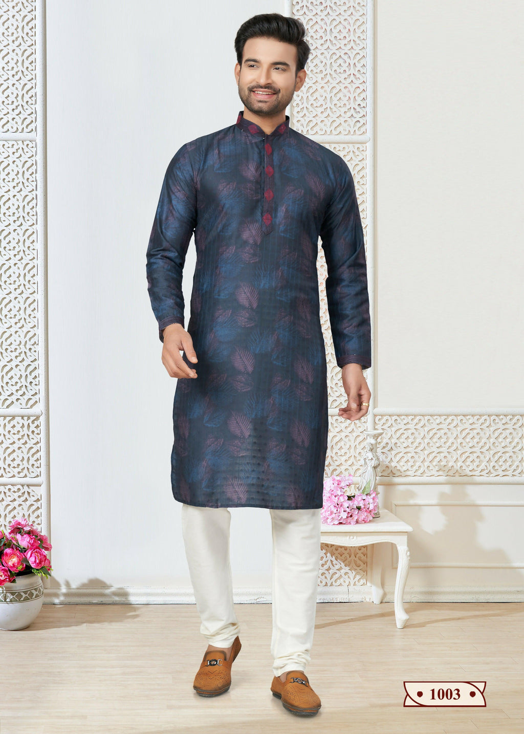 Toddler in a blue printed cotton kurta and pyjama set