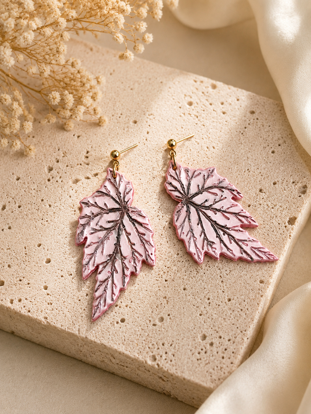 Begonia Lamoon botanical earrings featuring pink and gold polymer clay with a glossy finish