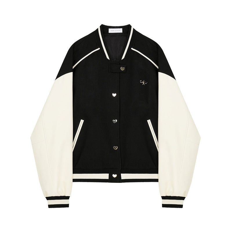 Women's black and cream gothic Harajuku varsity jacket with heart buttons and ribbed trim.