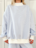 Blue and white mini striped mockneck sweatshirt in a relaxed unisex design.