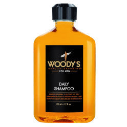 Bottle of Woody's Daily Shampoo with mint and grapefruit fragrance notes
